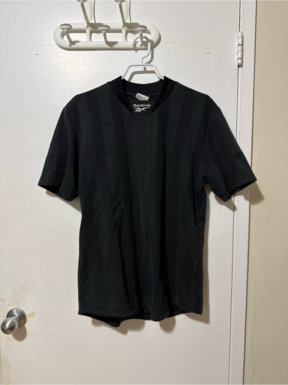 Reebok Black Short-Sleeve Athletic Tee with Subtle Stripe